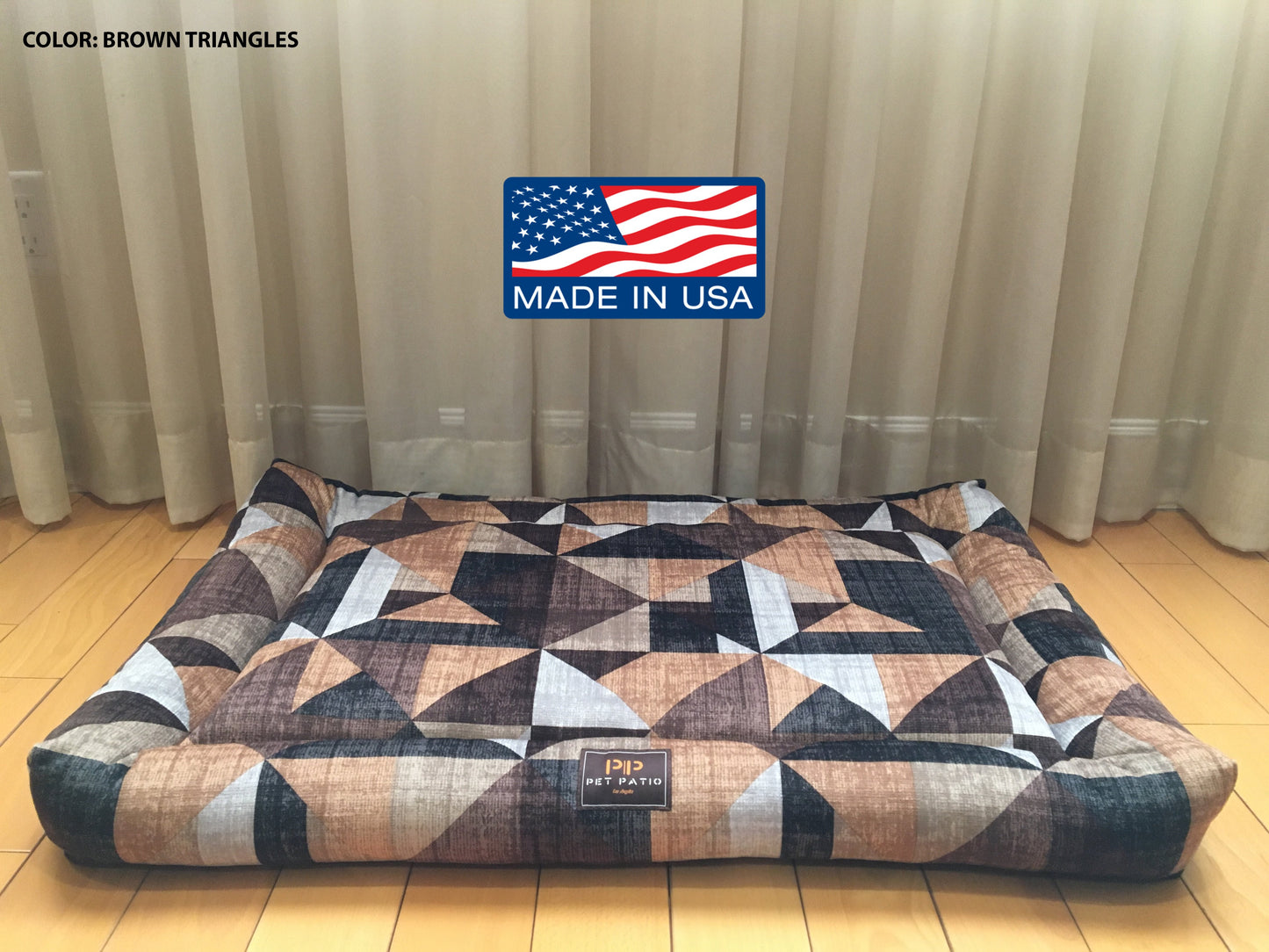 Brown triangle print dog bed with washable removable cover