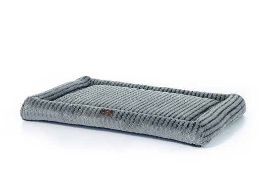 Solid gray orthopedic dog crate mat, handmade in Los Angeles