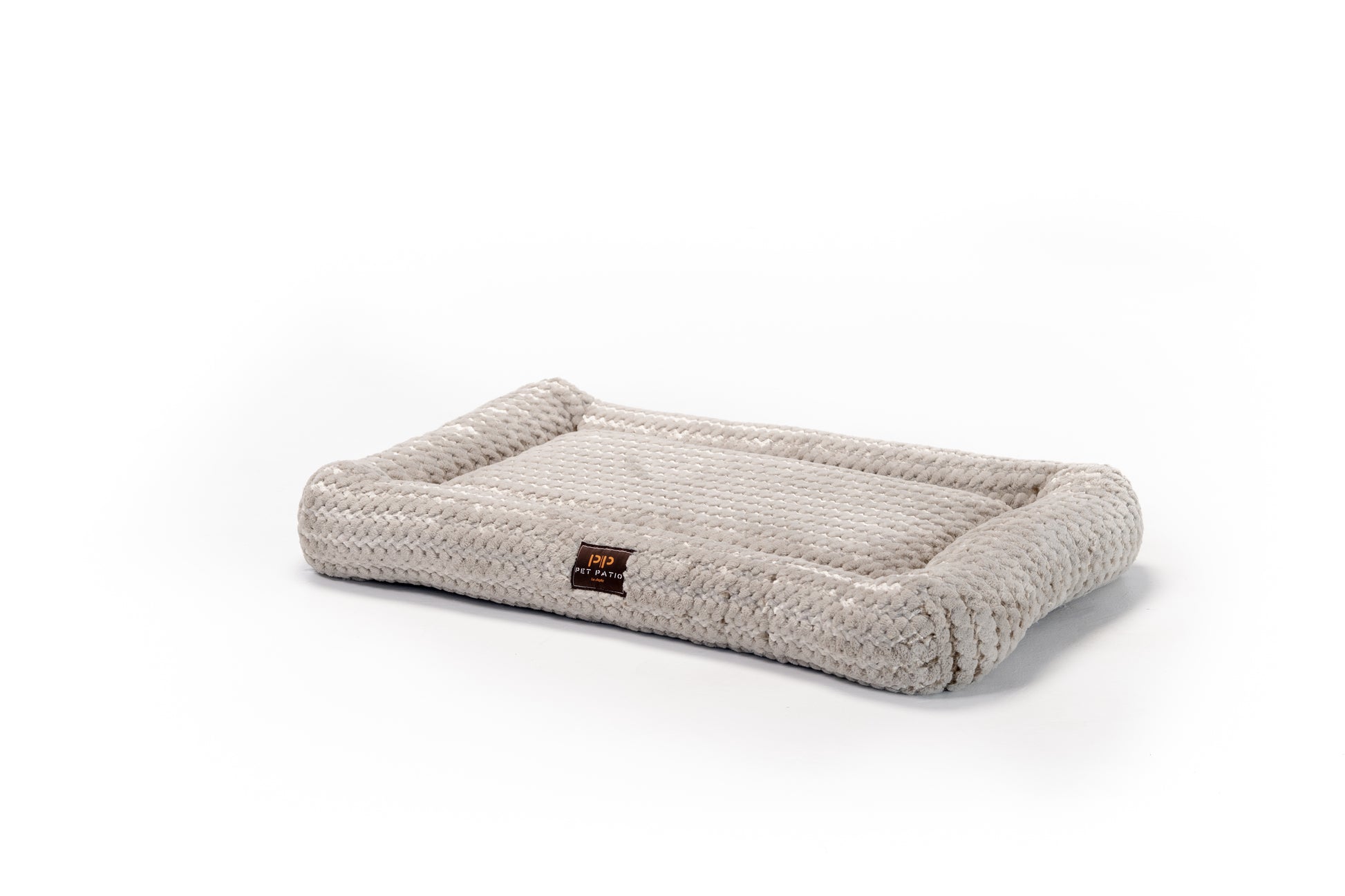 Beige solid color orthopedic dog crate mat by Pet Patio