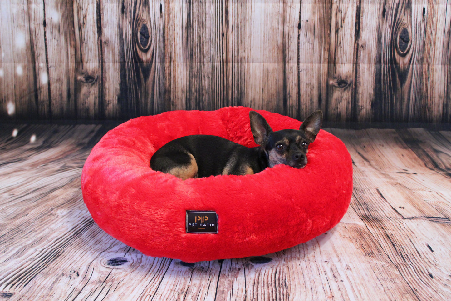 Red round nest dog bed, handmade in Los Angeles