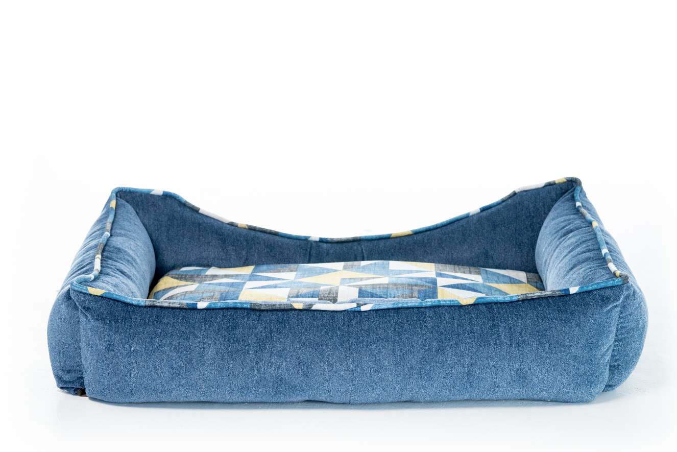 Handmade bolster sofa dog bed in blue triangle print